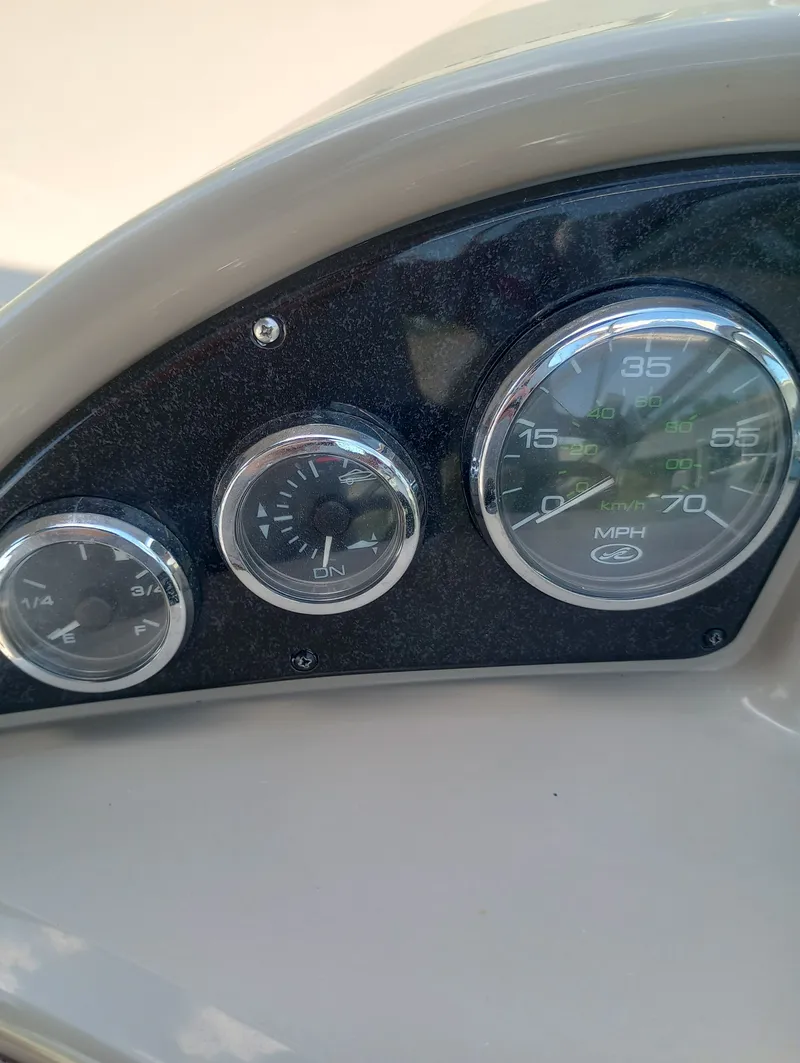 Slide: The Image of Dashboard of a 2005 Sea Ray 270 Amberjack boat. - 22