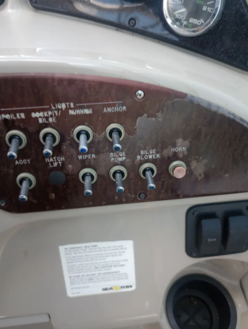 Slide: The Image of Control panel of a 2005 Sea Ray 270 Amberjack boat. - 23