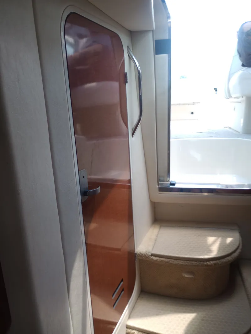 Slide: The Image of Interior of 2005 Sea Ray 270 Amberjack with door and steps. - 28