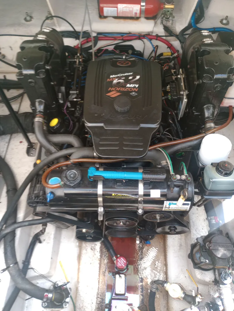 Slide: The Image of Engine compartment of a 2005 Sea Ray 270 Amberjack boat. - 30