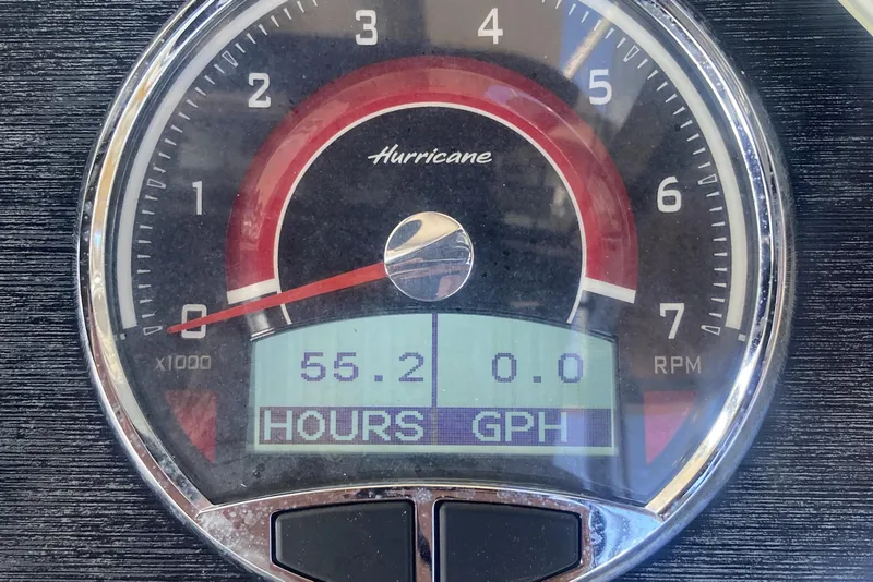Slide: The Image of Tachometer of 2023 Hurricane SunDeck 235 OB showing 55.2 hours and 0.0 GPH. - 14