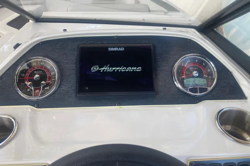 Slide: The Image of Dashboard of 2023 Hurricane SunDeck 235 OB boat with Simrad display and gauges. - 15
