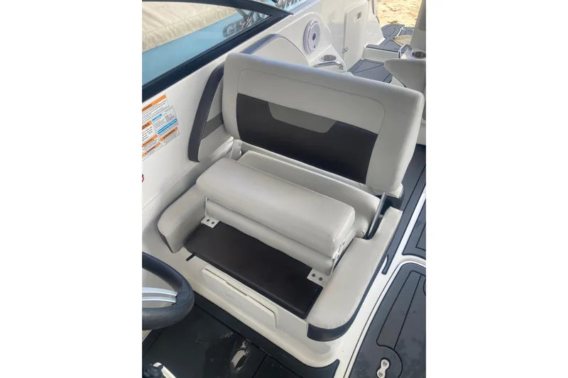Slide: The Image of 2023 Hurricane SunDeck 235 OB boat seat with adjustable backrest and sleek design. - 19