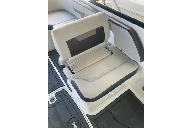 Slide: The Image of 2023 Hurricane SunDeck 235 OB boat seat with sleek, modern design and comfortable upholstery. - 22
