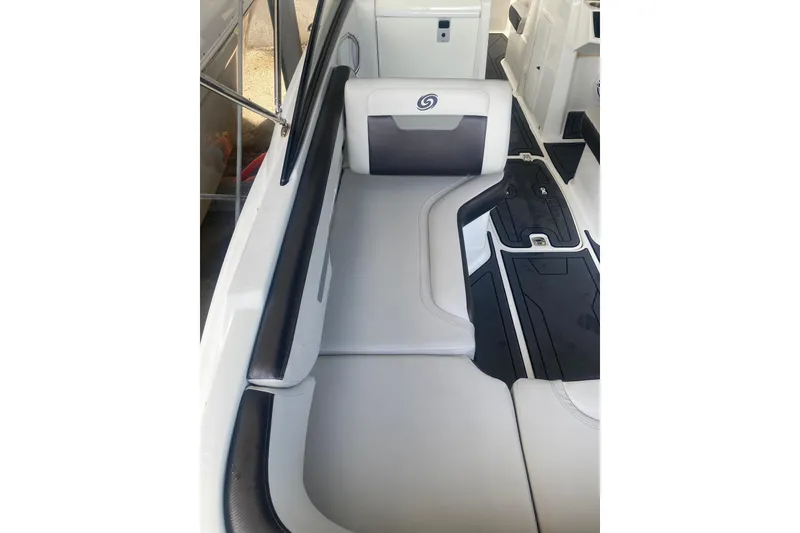 Slide: The Image of 2023 Hurricane SunDeck 235 OB interior seating with sleek, modern design and comfortable upholstery. - 24