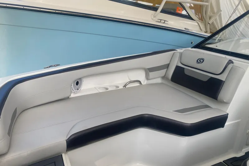 Slide: The Image of 2023 Hurricane SunDeck 235 OB boat interior with sleek seating and modern design. - 8