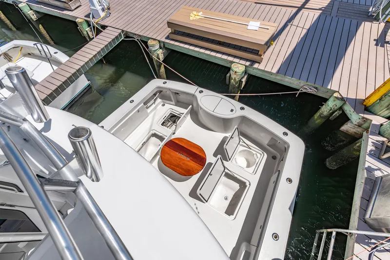 Slide: The Image of View of a 2004 Ocean Yachts 50 Convertible cockpit docked at a marina. - 41