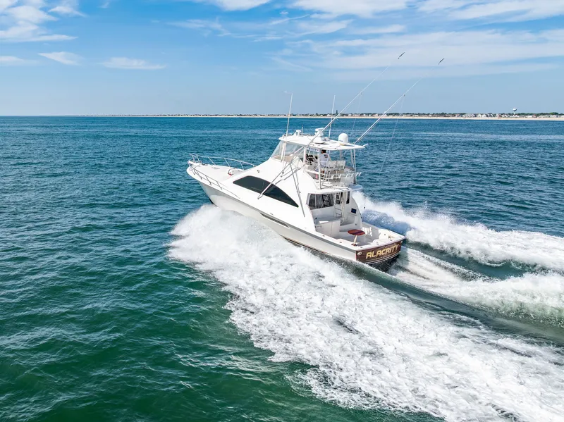 Slide: The Image of A white yacht speeds across the open sea, leaving a trail of frothy wake. - 7