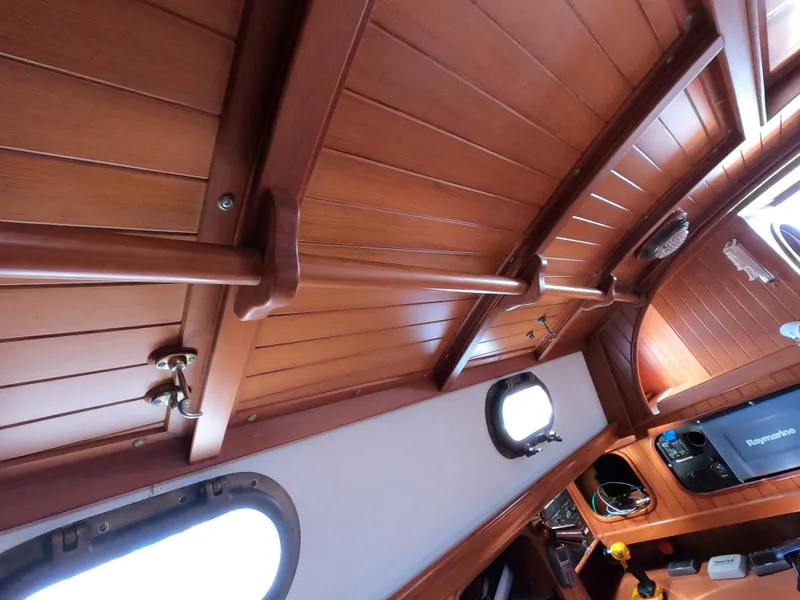 Slide: The Image of Interior of a 1986 Ta Shing Baba 40 yacht with wooden paneling. - 17