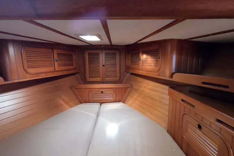 Slide: The Image of Interior cabin of 1986 Ta Shing Baba 40 sailboat with wooden finish and storage. - 25