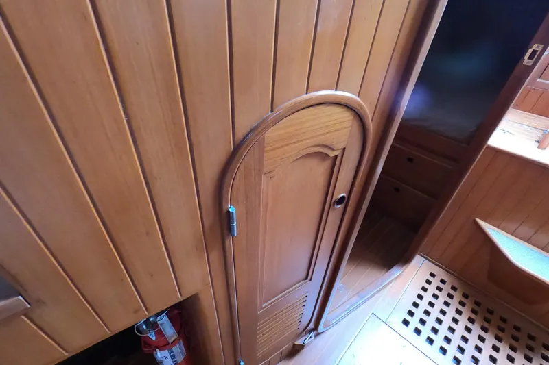Slide: The Image of Interior of 1986 Ta Shing Baba 40 sailboat with wooden paneling and door. - 33
