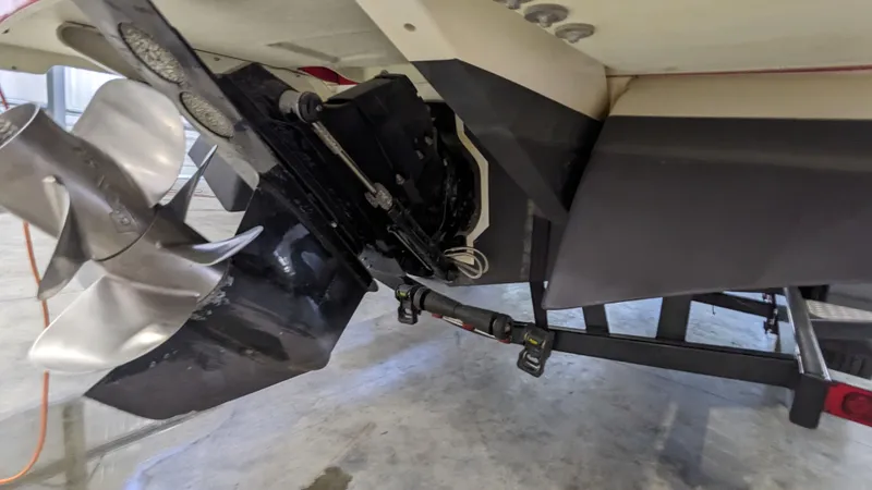 Slide: The Image of Rear view of a 2022 Four Winns 260H boat with propeller. - 19