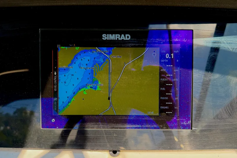 Slide: The Image of Simrad navigation display on 2022 Sea Ray SPX 210 Outboard boat, showing coastal map. - 17