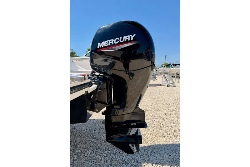 Slide: The Image of 2022 Sea Ray SPX 210 Outboard with Mercury engine on gravel lot. - 29
