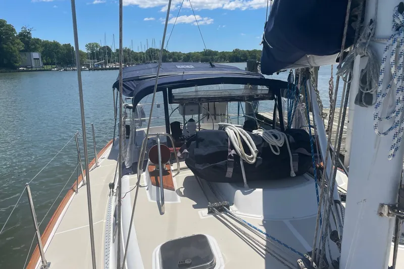 Slide: The Image of Sailboat Tartan 3700, 2001 model, docked on a sunny day with clear skies. - 21