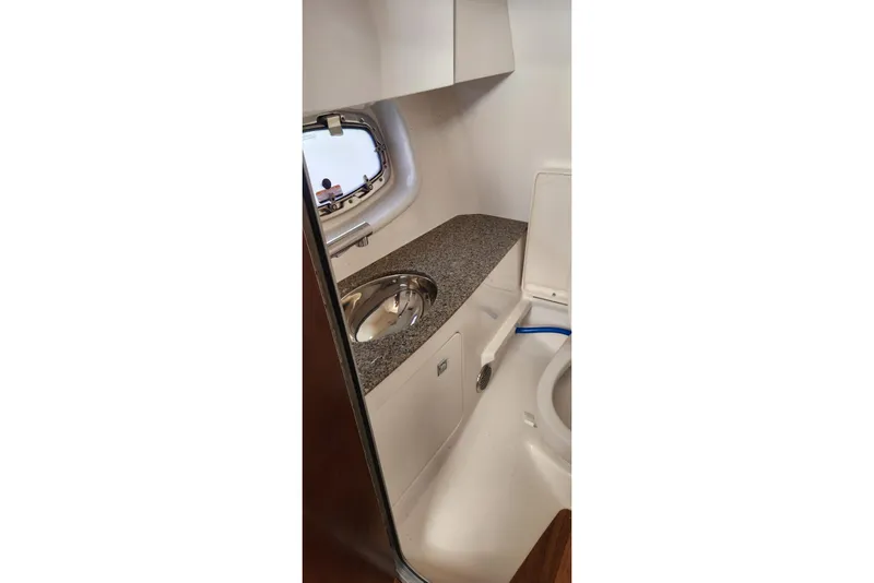 Slide: The Image of 2023 Chaparral 347 SSX boat interior with sink and countertop. - 11