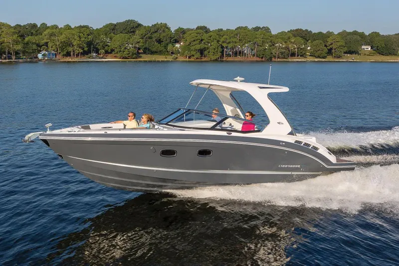 Slide: The Image of Manufacturer Provided Image: 2023 Chaparral 347 SSX boat cruising on a lake with passengers. - 20