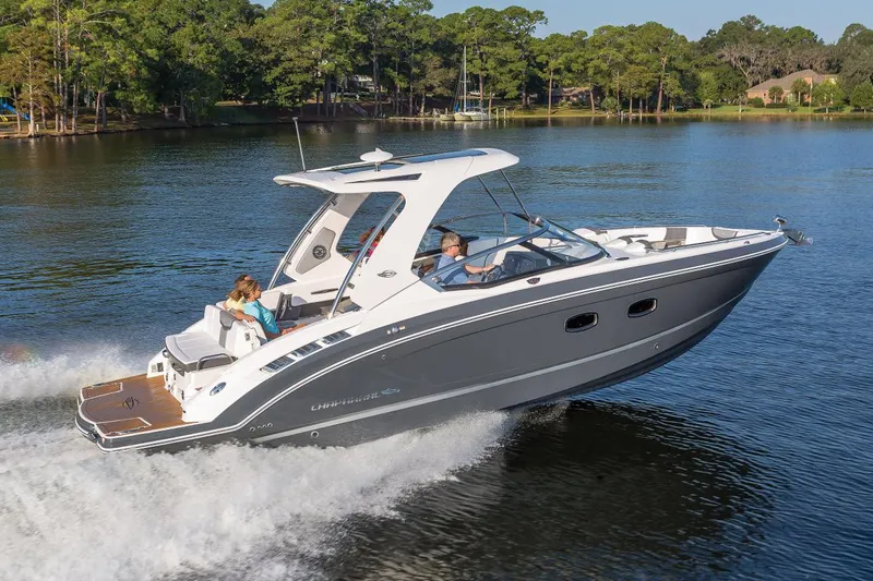 Slide: The Image of Manufacturer Provided Image: 2023 Chaparral 347 SSX boat cruising on a lake with passengers. - 21