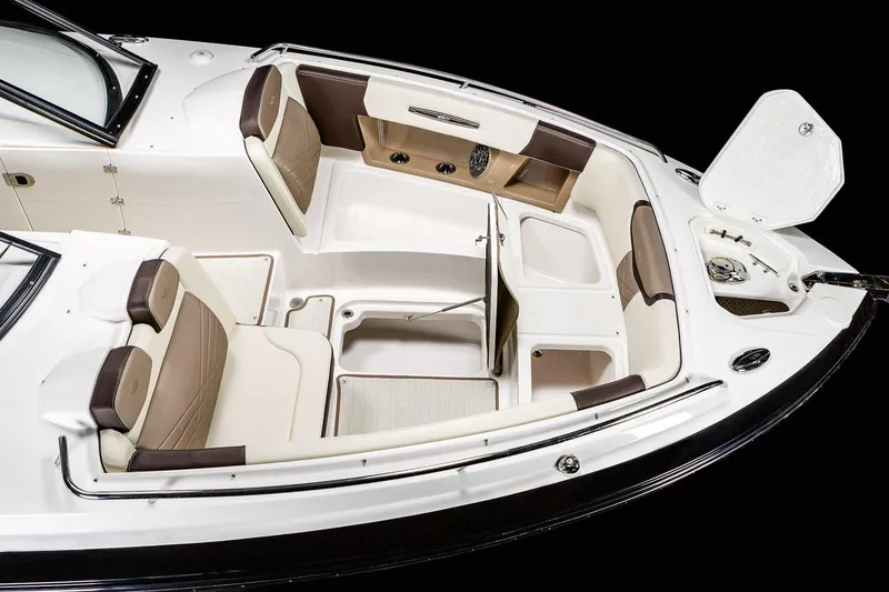 Slide: The Image of Manufacturer Provided Image: 2023 Chaparral 347 SSX boat interior with seating and storage compartments. - 24