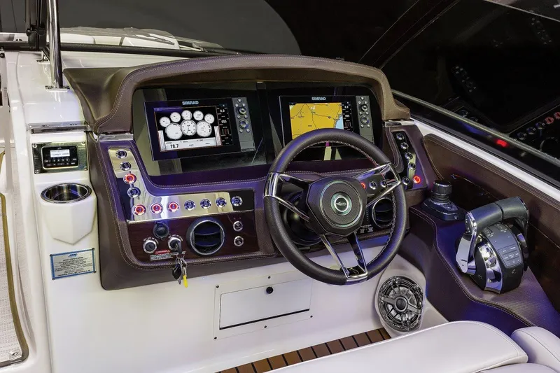 Slide: The Image of Manufacturer Provided Image: 2023 Chaparral 347 SSX boat dashboard with advanced navigation and control systems. - 26