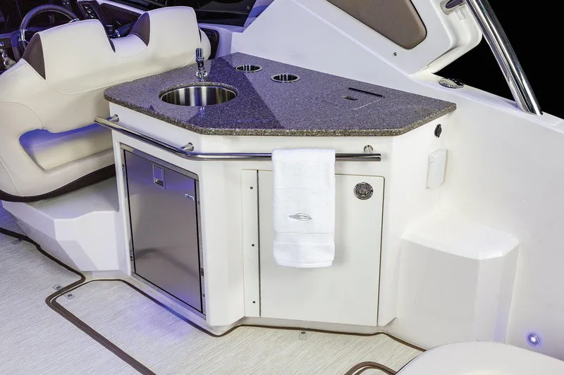 Slide: The Image of Manufacturer Provided Image: 2023 Chaparral 347 SSX boat interior with kitchenette and sink. - 28