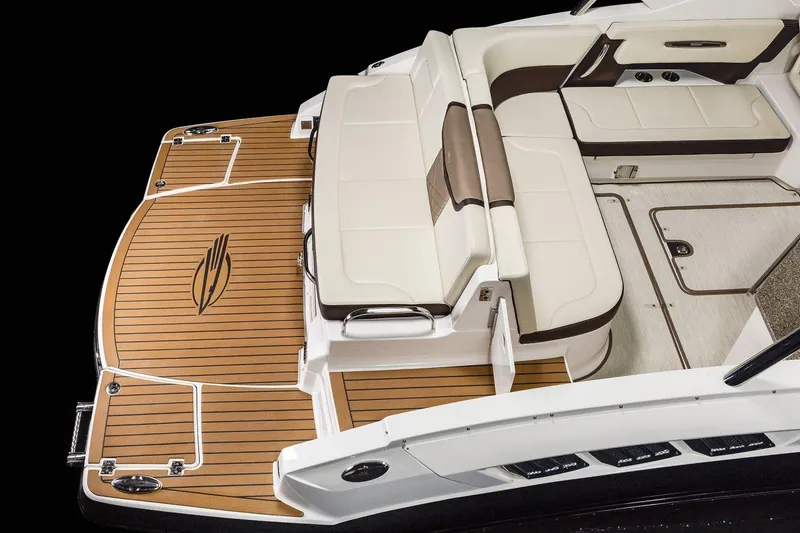 Slide: The Image of Manufacturer Provided Image: 2023 Chaparral 347 SSX boat with teak deck and white cushioned seating. - 31