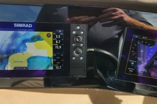 Slide: The Image of Dashboard of 2023 Chaparral 347 SSX with Simrad navigation display. - 7