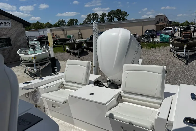 Slide: The Image of 2020 Everglades 253 Center Console boat with white seating and Yamaha engine. - 3