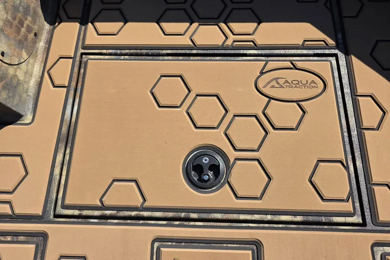 Slide: The Image of Hexagonal-patterned AquaTraction flooring on 2026 Excel 183 Tomahawk boat. - 19