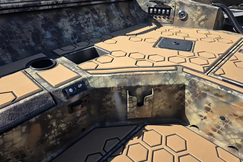 Slide: The Image of Interior of 2026 Excel 183 Tomahawk boat with hexagonal pattern flooring. - 23