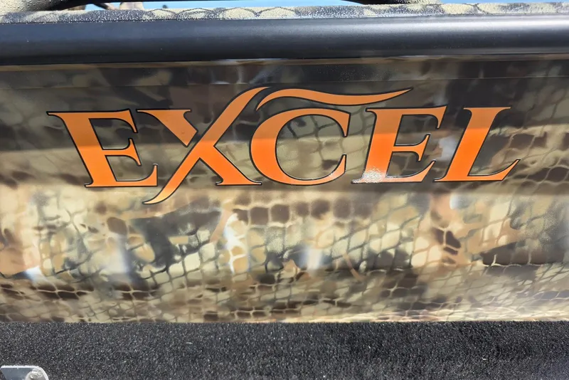 Slide: The Image of Excel 183 Tomahawk 2026 logo on camouflage-patterned surface. - 5