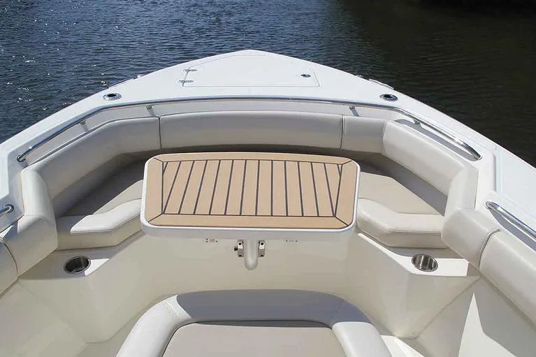 Slide: The Image of Manufacturer Provided Image: 2025 Boston Whaler 280 Outrage boat with spacious seating and sleek design. - 7