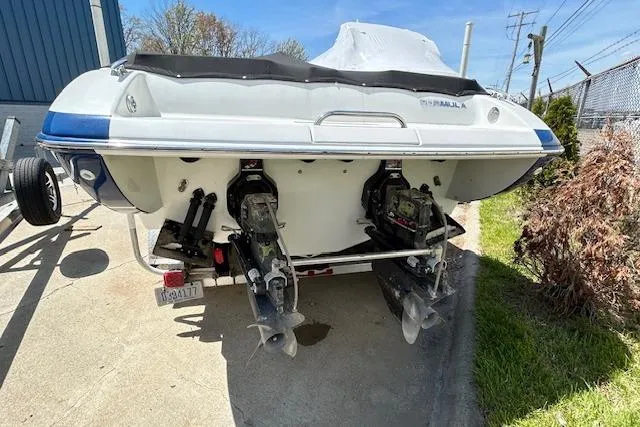 Slide: The Image of Rear view of a 2004 Formula 292 FASTech boat on a trailer. - 4