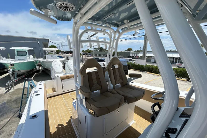 Slide: The Image of 2025 Cape Horn 34 XS boat interior with dual seats and modern helm. - 12