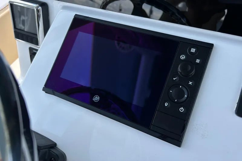 Slide: The Image of Dashboard of 2025 Cape Horn 34 XS boat with modern navigation controls. - 7