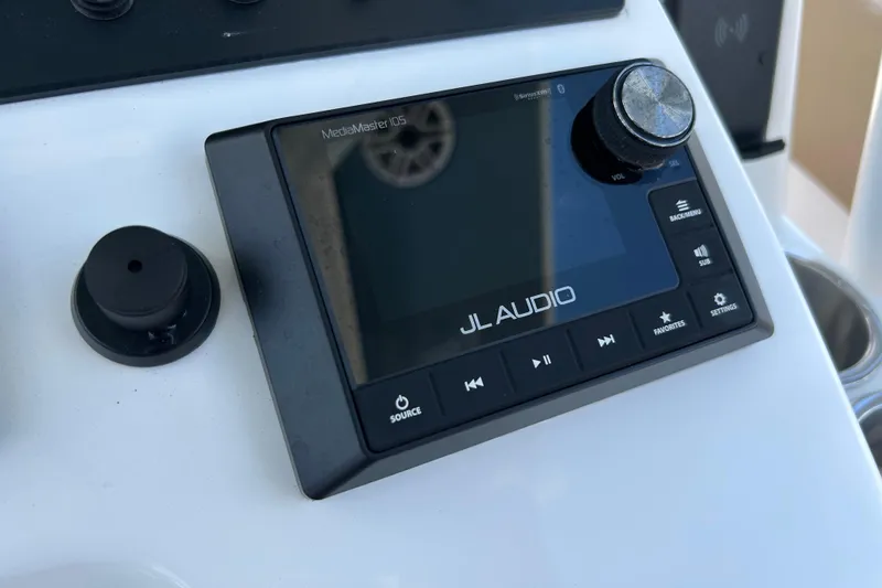 Slide: The Image of JL Audio MediaMaster display on 2025 Cape Horn 34 XS boat dashboard. - 8