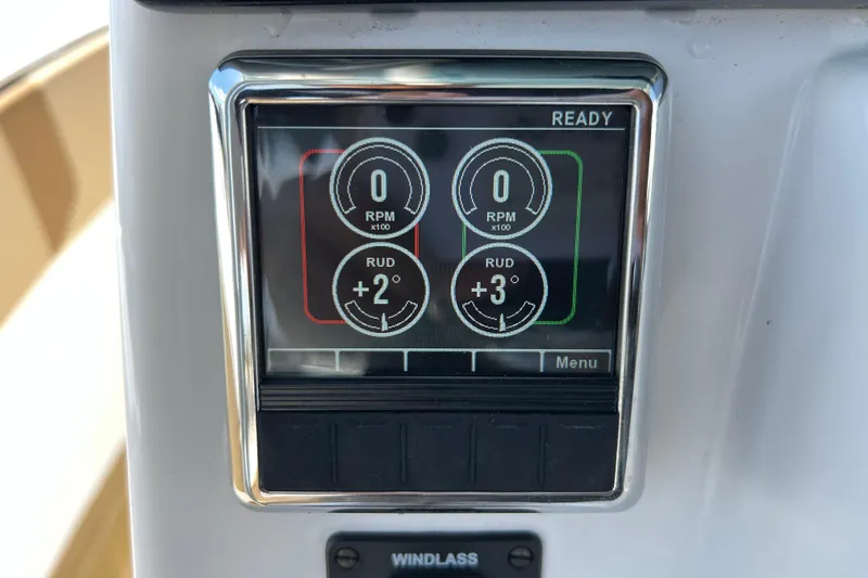 Slide: The Image of Digital display on 2025 Cape Horn 34 XS boat showing RPM and rudder angle. - 9