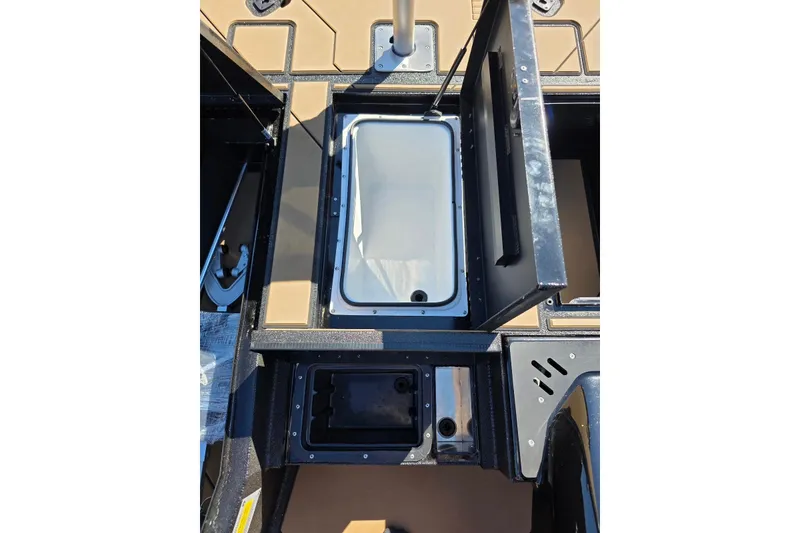Slide: The Image of Open storage compartments on a 2026 Excel EX 183 boat deck. - 10