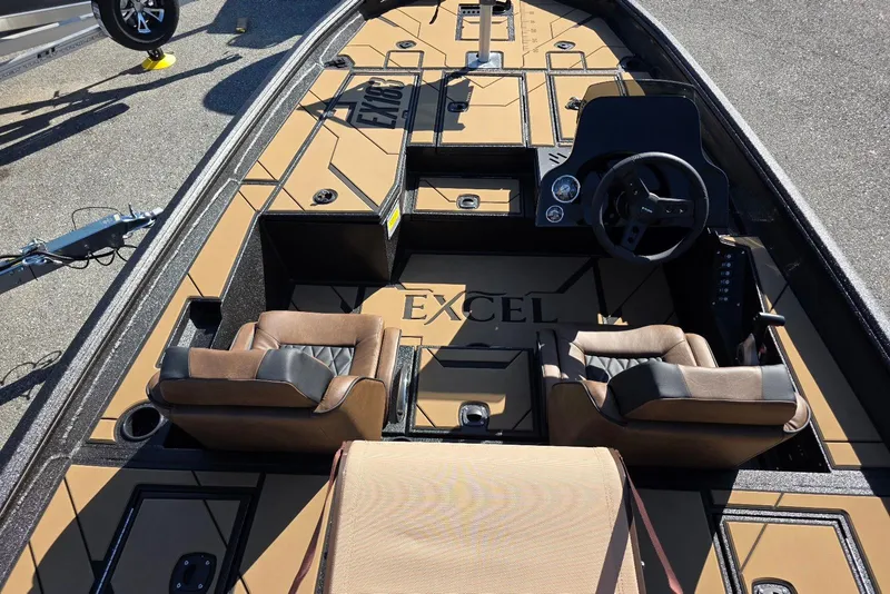 Slide: The Image of 2026 Excel EX 183 boat interior with dual seats and steering console. - 6