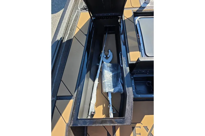 Slide: The Image of Storage compartment of 2026 Excel EX 183 boat with equipment inside. - 9