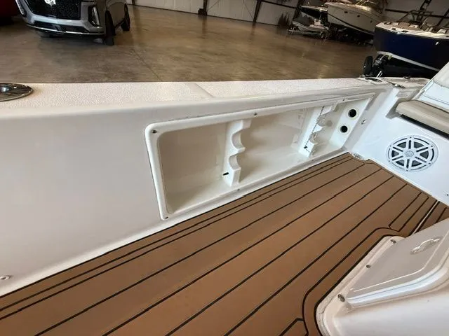 Slide: The Image of Interior view of a 2017 Sea Fox 240 Viper boat with wood-look flooring. - 13