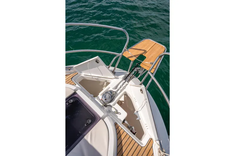 Slide: The Image of Bow view of 2025 Beneteau Antares 11 Fly with anchor and teak deck. - 35