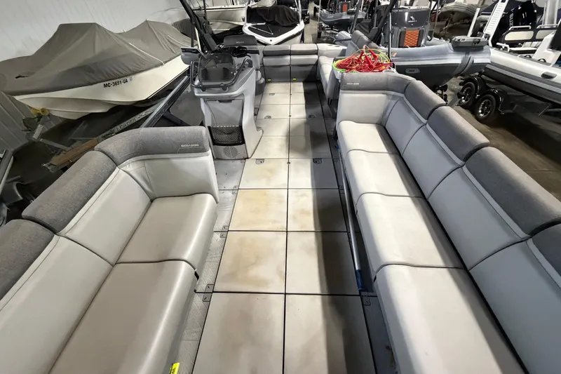 Slide: The Image of 2022 Sea-Doo Switch Cruise 21 interior with spacious seating and modern design. - 10