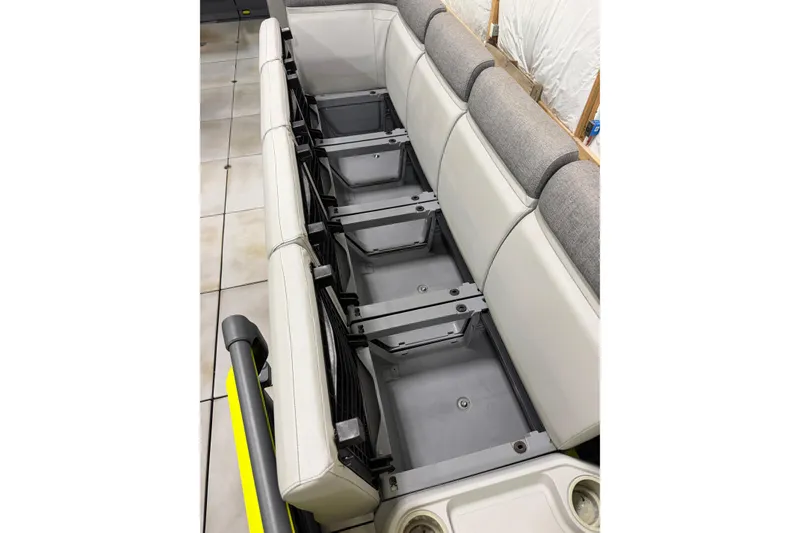 Slide: The Image of 2022 Sea-Doo Switch Cruise 21 interior seating with storage compartments. - 11