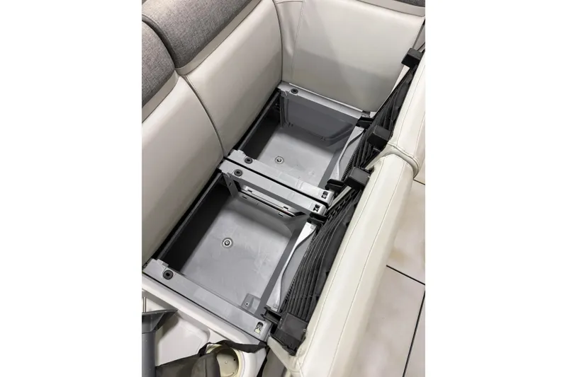 Slide: The Image of 2022 Sea-Doo Switch Cruise 21 under-seat storage compartment, showcasing spacious design and functionality. - 12