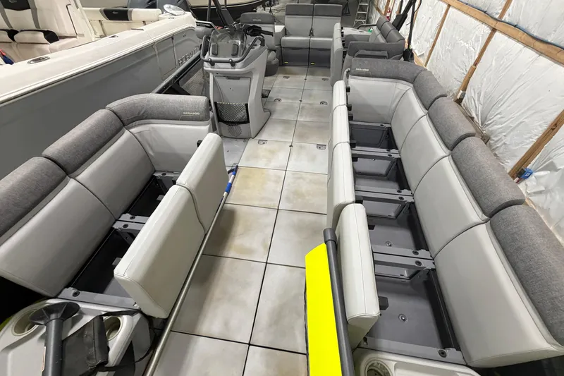 Slide: The Image of 2022 Sea-Doo Switch Cruise 21 interior with spacious seating and modern design. - 16