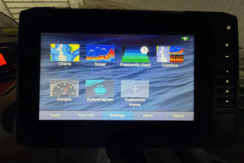 Slide: The Image of Garmin display on 2022 Sea-Doo Switch Cruise 21 showing navigation and sonar options. - 7