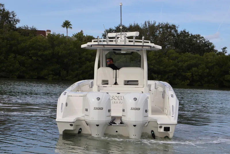 Slide: The Image of 2021 Pursuit S 328 Sport boat on calm water. - 5