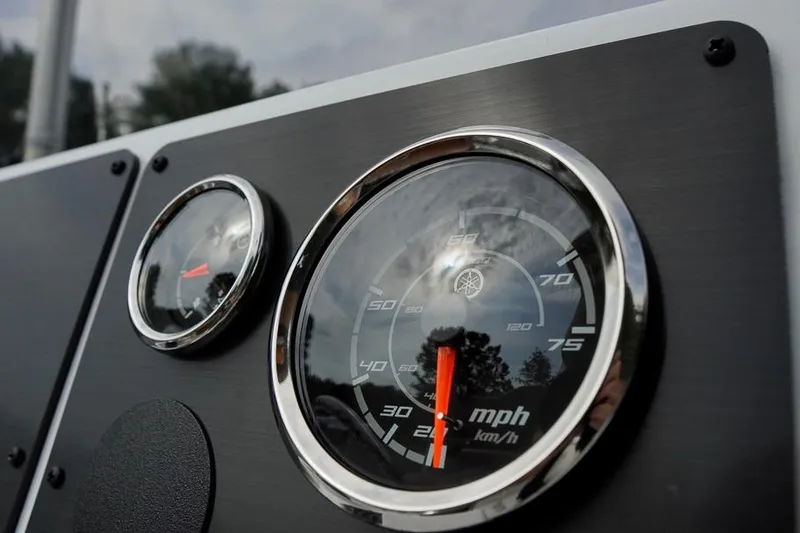 Slide: The Image of Close-up of 2026 G3 Bay 21 GX Tunnel speedometer and gauge panel. - 11