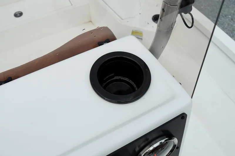 Slide: The Image of Cup holder on 2026 G3 Bay 21 GX Tunnel boat console, featuring sleek design. - 14
